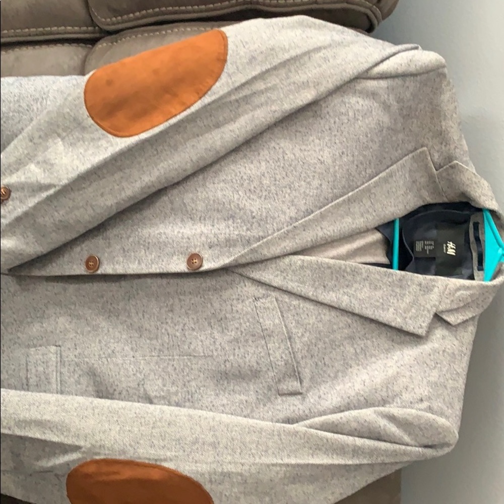 Blazer with arm patches.